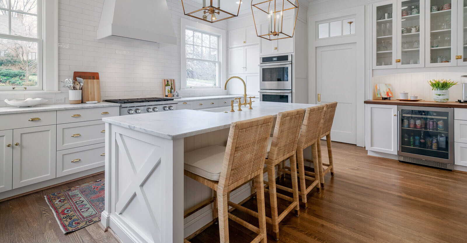 For this kitchen renovation in Winston Salem, we took a cramped galley-style space and transformed it into a large eat-in style kitchen for a family of four.
