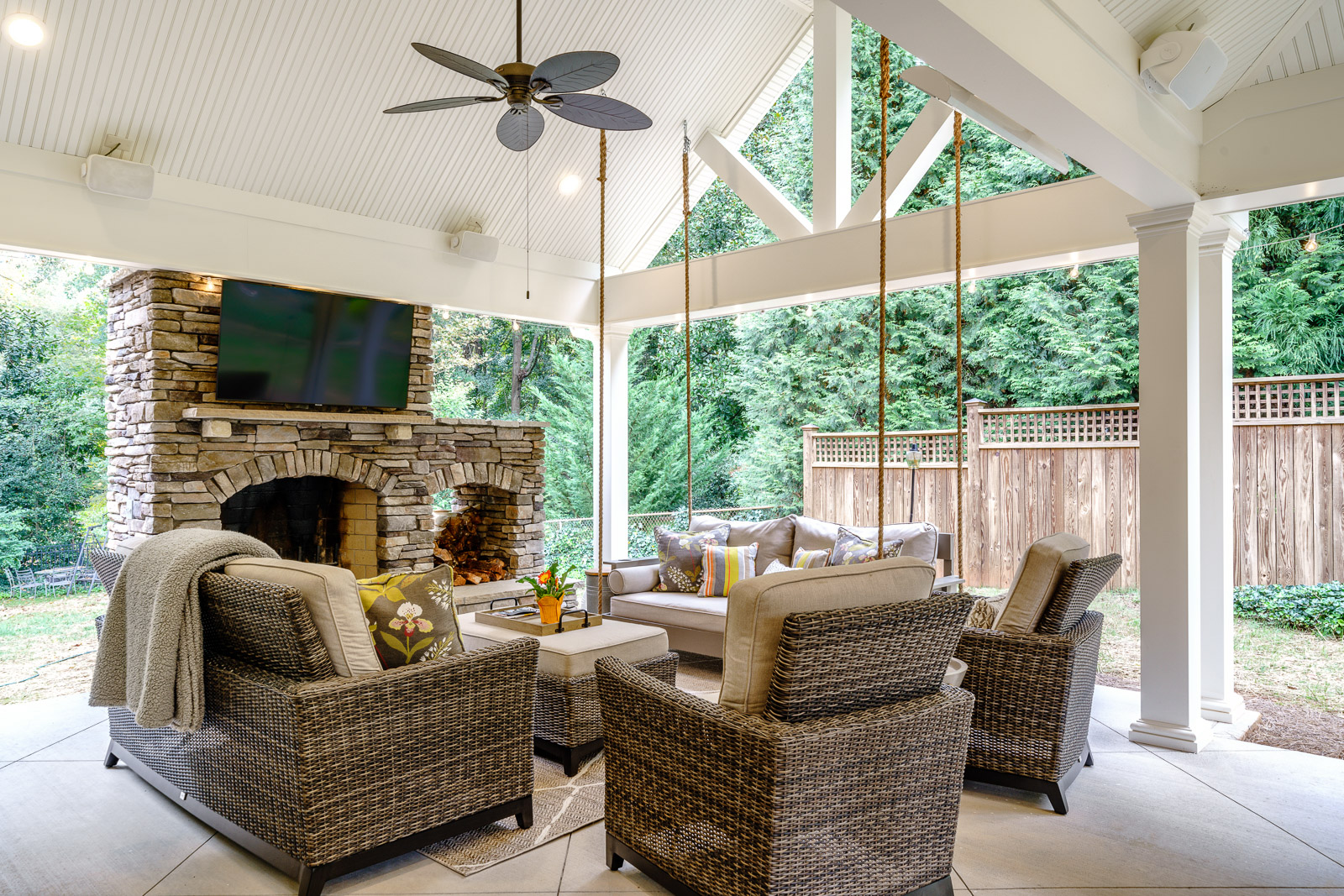 This large covered patio remodeling project is an ideal space to comfortably enjoy the outdoors year-round.